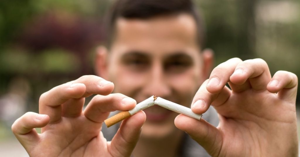 Man quitting smoking in Neath pharmacy stop smoking service