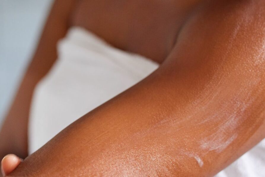 Pharmacist advising on sun protection and sensitive skincare in Neath