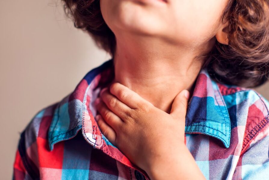 girl with sore throat