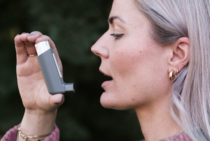 woman using inhaler