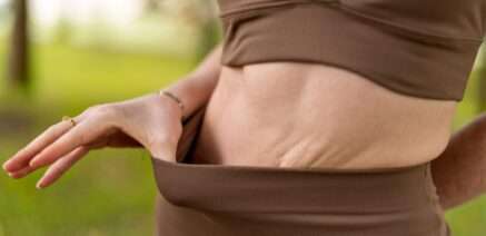 Pharmacist providing body composition analysis to support a 12-month post-GLP-1 plan